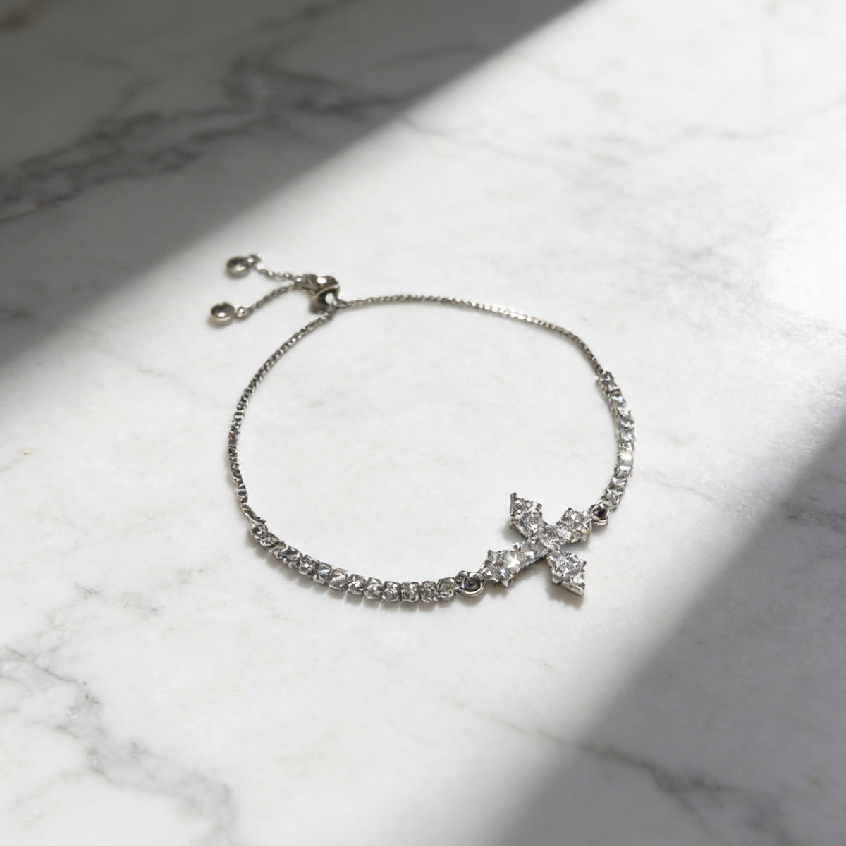 Cross Centerpiece Tennis Bracelet